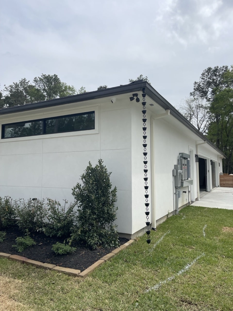 Seamless gutter and downspout on a modern home